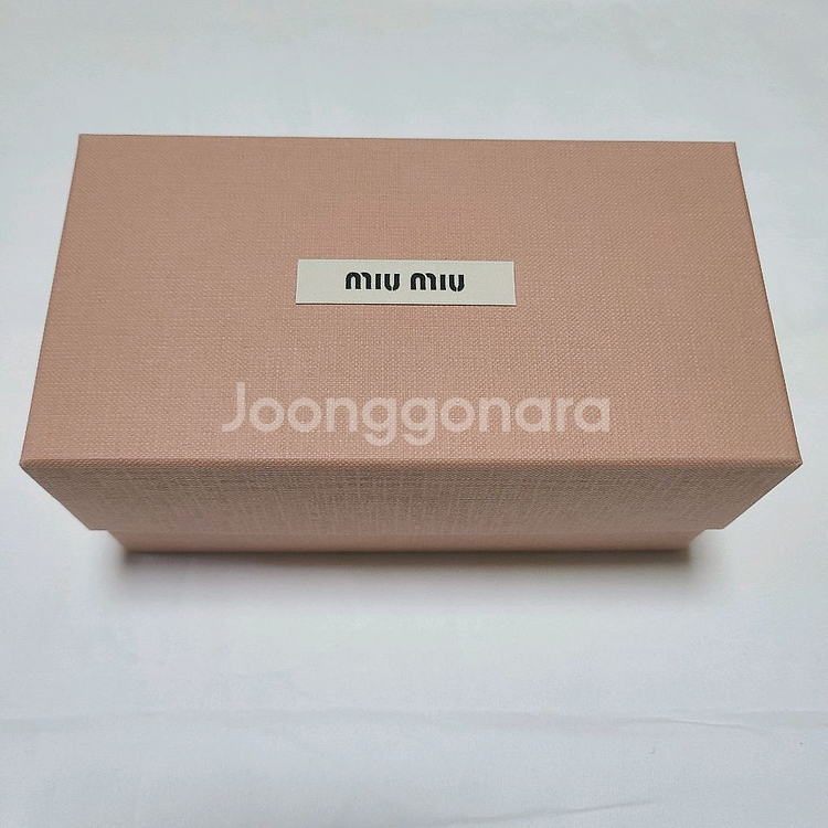 미우미우 글림스 오벌 선글라스 블랙--1