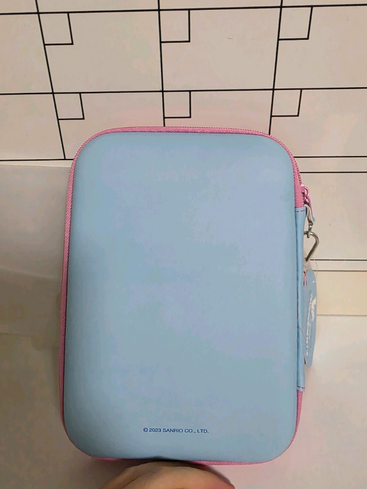 [산리오X던킨] 여행용 멀티 파우치(시나모롤) 이미지