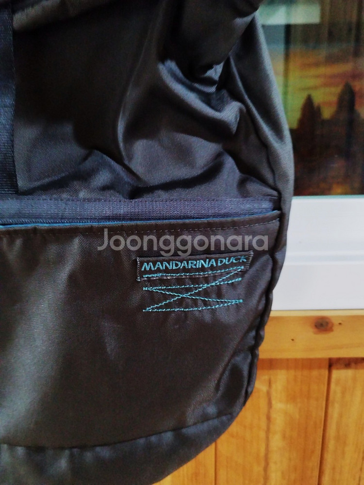 만다리나덕 캔버스 롤 백팩--1