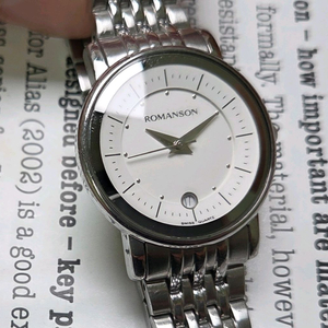 빈티지 로만손 화이트다이얼 칼침핸즈 쿼츠 28mm 여성