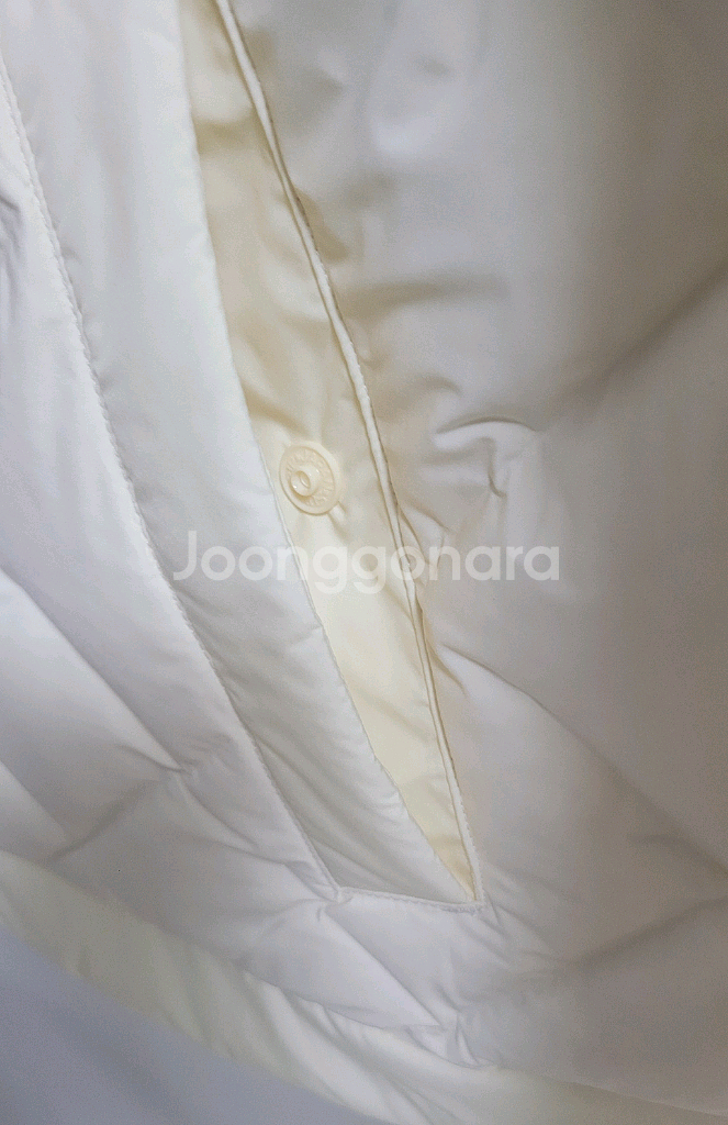 새상품)디스커버리 여성 구스다운 튜브 경량패딩--5