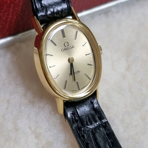 오메가 드빌 빈티지 오벌 샴페인 선레이다이얼 수동 여성