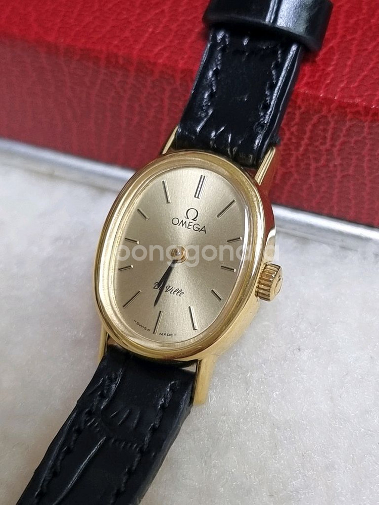 오메가 드빌 빈티지 오벌 샴페인 선레이다이얼 수동 여성--1