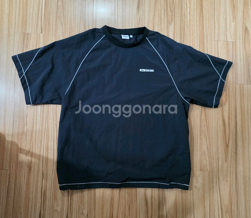 휠라 오버핏 우븐 반팔티셔츠--0