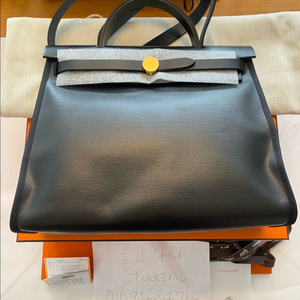 에르메스 에르백 31 코팅 캔버스 에크루 누아 블랙