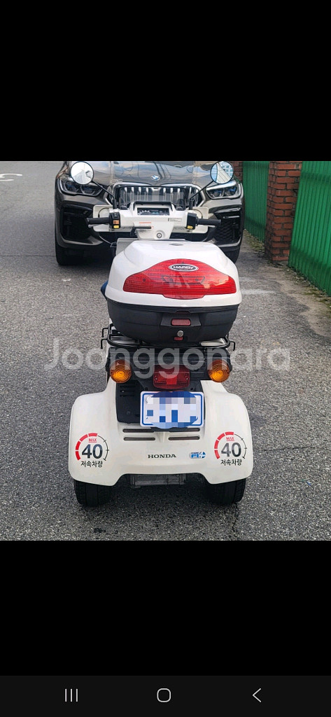 상태좋은 2010년식 혼다 자이로X 4T 흰색 팝니다--3