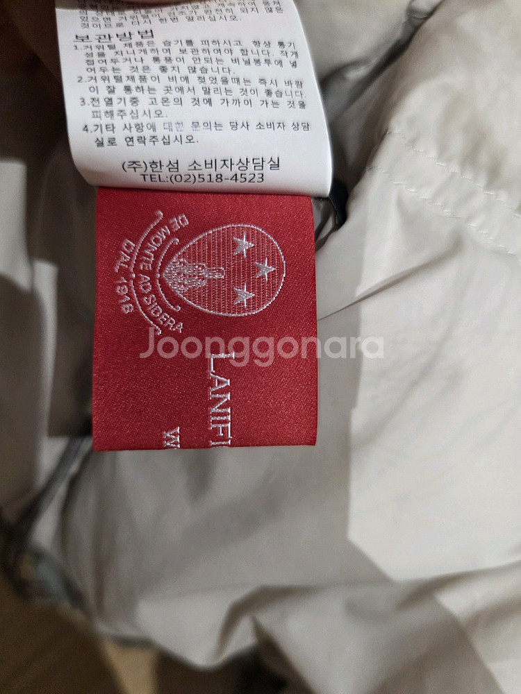 22 더캐시미어 구스다운 패딩조끼--7