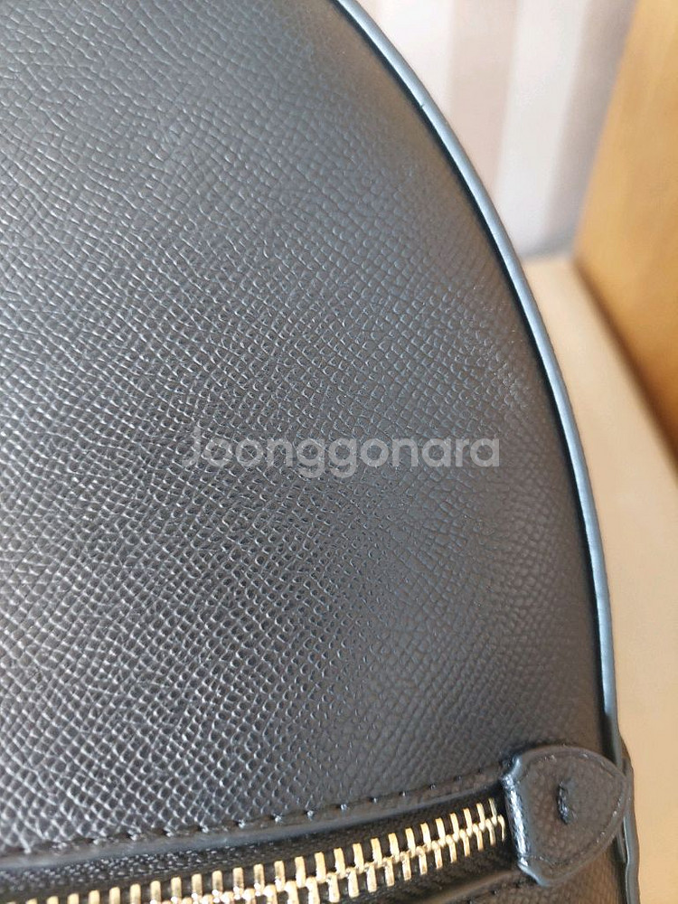 코치 여성 백팩 (하트 퍼 크로스백 증정)--1