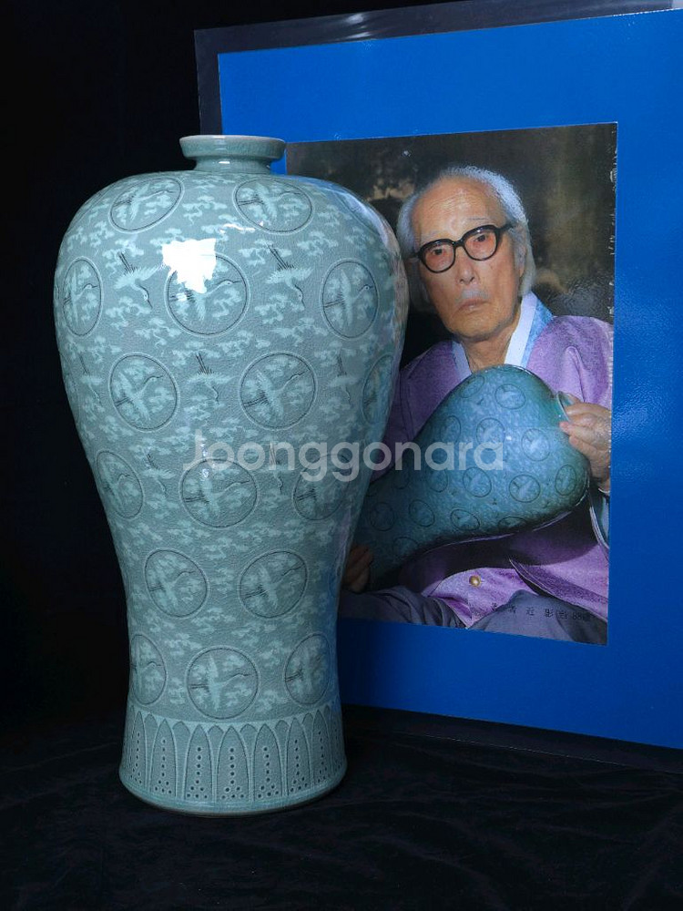 해강유근형 청자흑백상감운학문매병--0