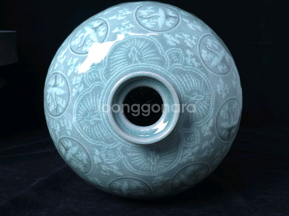 해강유근형 청자흑백상감운학문매병--3