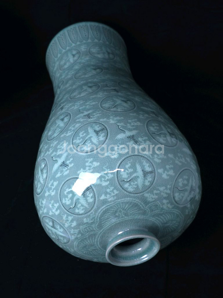 해강유근형 청자흑백상감운학문매병--6