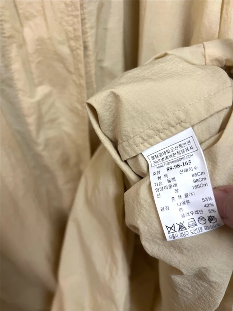 한섬 SJSJ 바스락 나일론 바람막이 롱 점퍼 트렌치 경량 자켓 코트 간절기 옐로우베이지 이미지