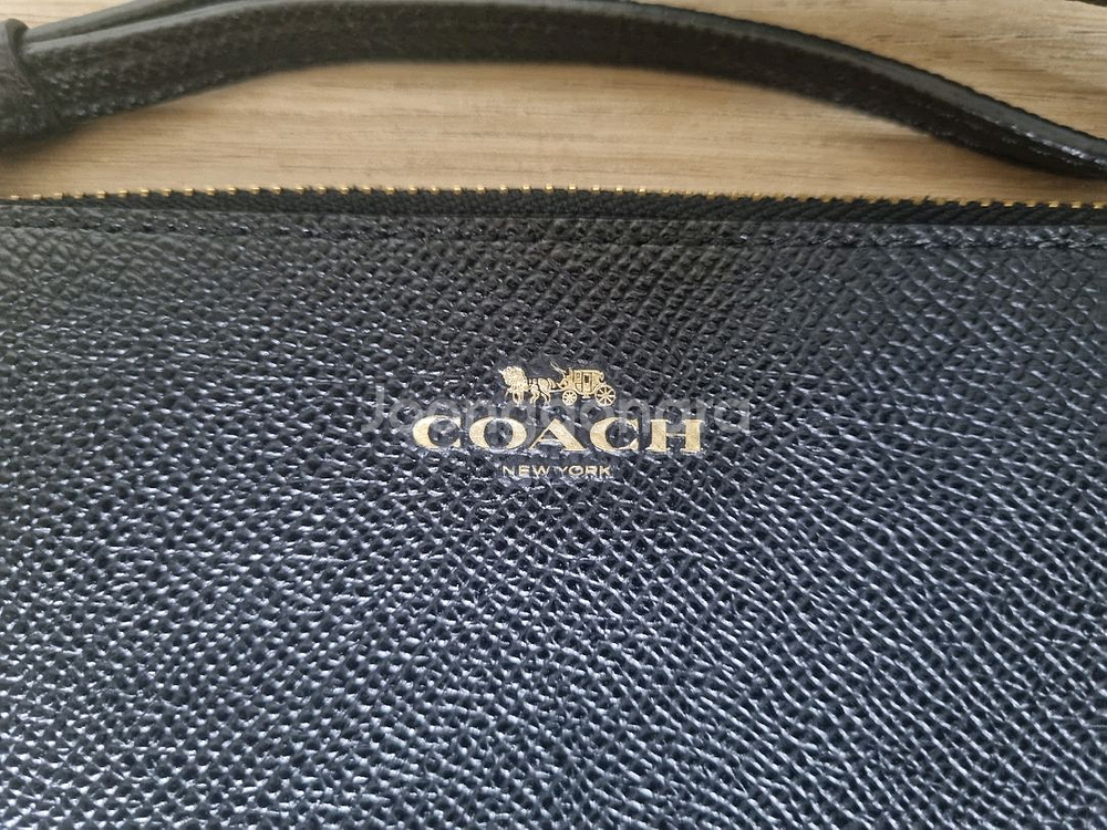 코치(coach)손목지갑(리슬릿)--1