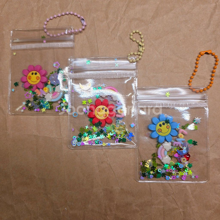 행운 지퍼백 스마일꽃 키링 3개.--0