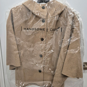 더 캐시미어 블렌드 핸드메이드 후드 코트.