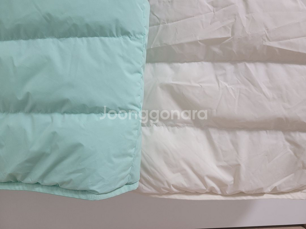 새상품)디스커버리 구스다운 양면 베스트 패딩조끼--9