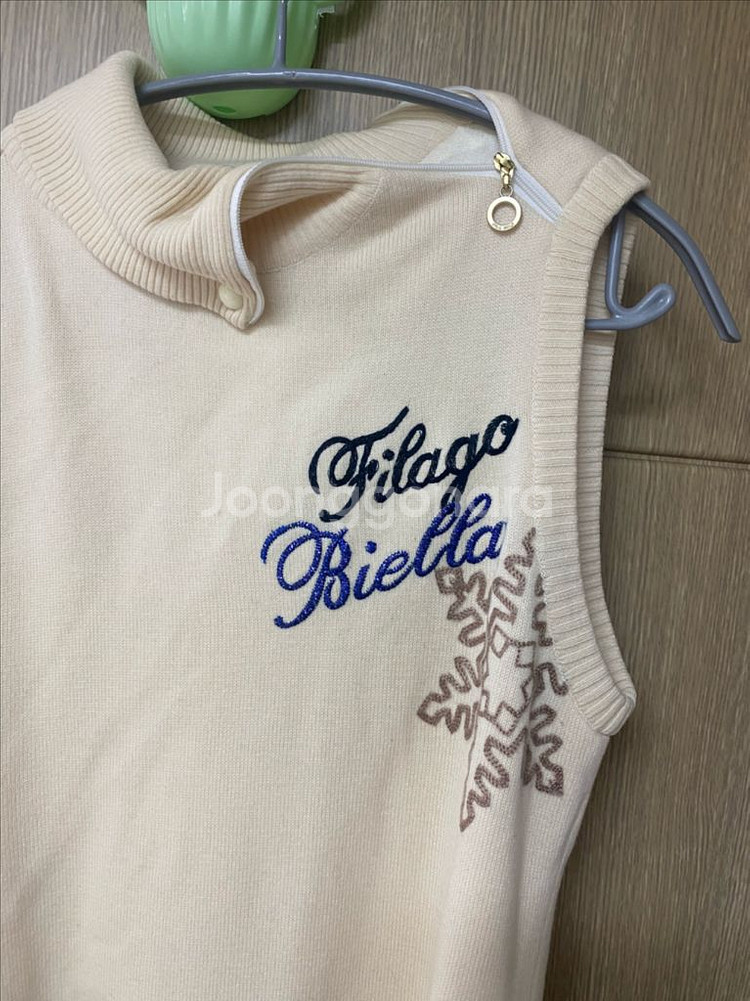 휠라골프 여성 목폴라 니트 조끼 골프복 95사이즈--1