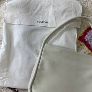 여밈 릿지백 크림