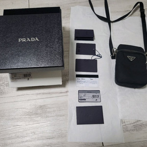 프라다 리나일론 미니 크로스백 블랙