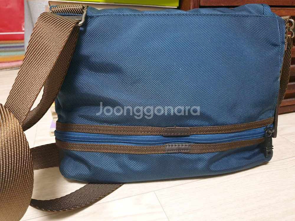 투미 확장형 크로스가방--1