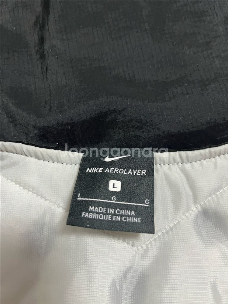 [L] 나이키 에어로레이어 와일드 런 베스트--2