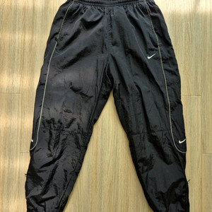 나이키 솔로 스우시 우븐 트레이닝 바지