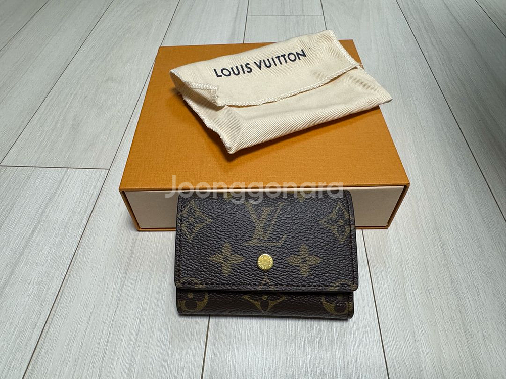 루이비통 모노그램 캔버스 카프스킨 중지갑 마이크로 브라운 (새상품)--0