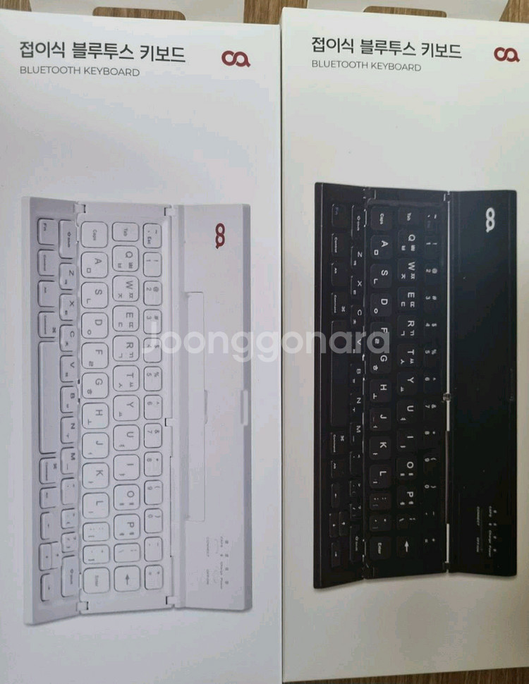 오아 4단 접이식 휴대용 무선 블루투스 키보드--0