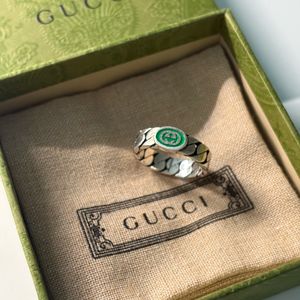 구찌 인터로킹 G 에나멜 링