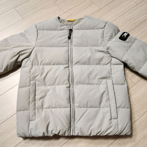 내셔널지오그래픽 키즈 오리털 경량 패딩 130(베이지)