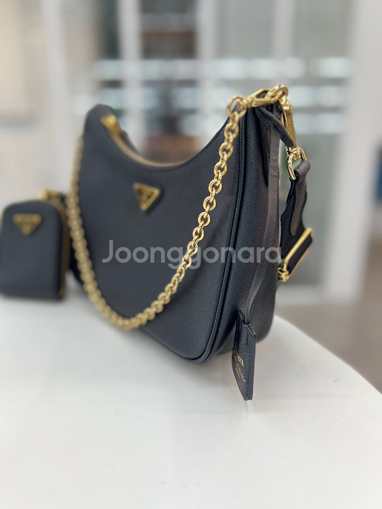 [중고명품 럭스올 울산점]프라다 리에디션 사피아노 숄더백 내장칩--1