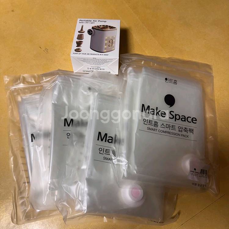 인트홈 이불정리세트 압축팩 4개 + 압축기 새상품 판매합니다.--2