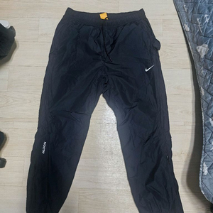 나이키 드레이크 녹타 우븐 트렉 팬츠 블랙M