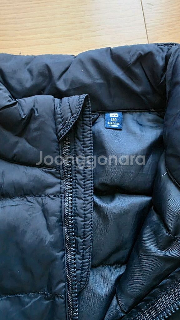 유니클로 경량 패딩 조끼(베스트) 130--2