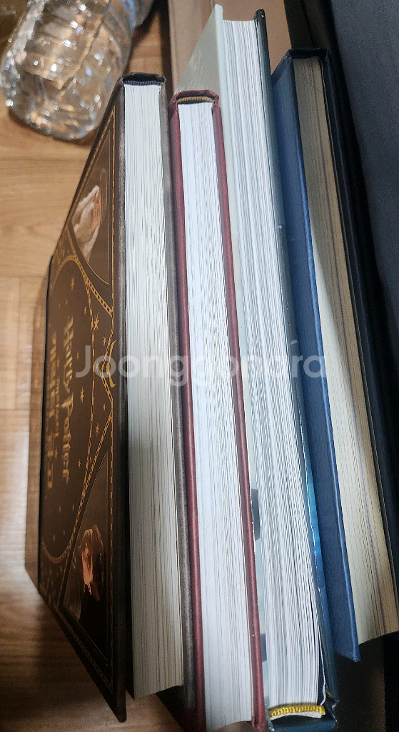 해리포터 책 마법 금고 시리즈 + 그린델왈드 아트북 팝니다.--6