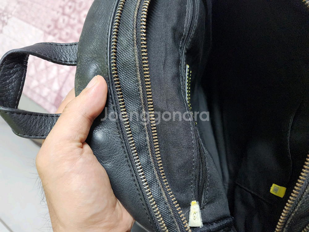 가죽 가방 만다리나덕 백팩--2