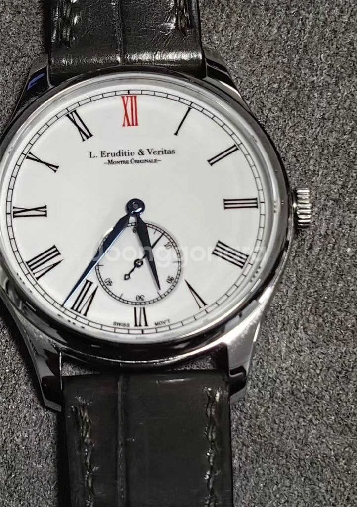 L. Eruditio & Veritas 시계 구매합니다--0