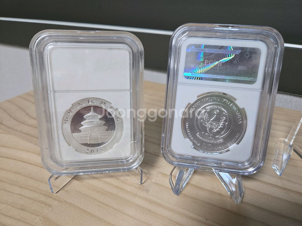 중국 팬더 & 르완다 돼지 은화 각 1온스 판매합니다.--1