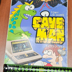 토미에서 출시된 케이브맨 LSI 고전.레트로 게임기