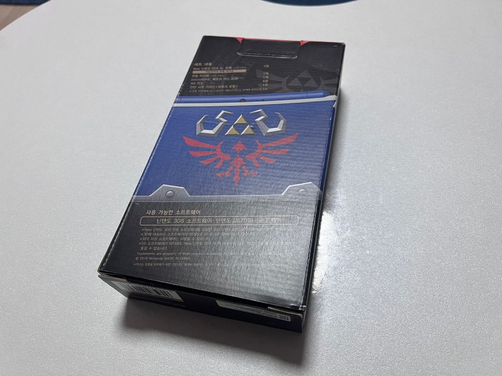 [미사용] 뉴 닌텐도 2ds xl - 하일리아 방패 에디션 + 젤다의전설 1 2 + 포켓몬 뱅크 + 시간의 오카리나 이미지