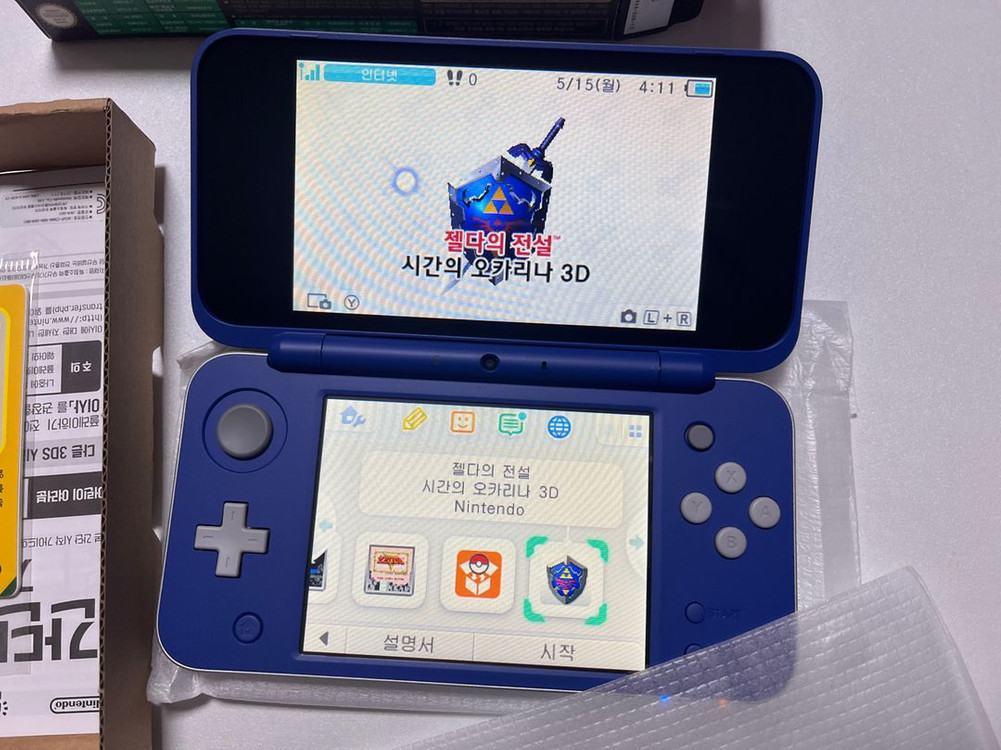 [미사용] 뉴 닌텐도 2ds xl - 하일리아 방패 에디션 + 젤다의전설 1 2 + 포켓몬 뱅크 + 시간의 오카리나 이미지