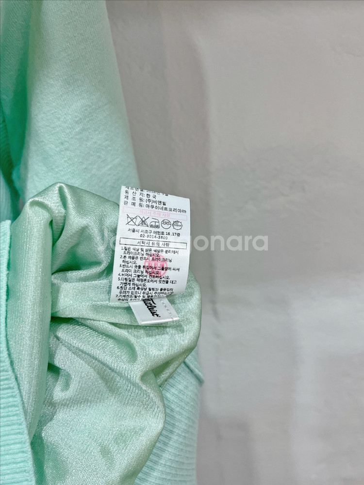 (66/m) 타이틀리스트 피스타치오 사선집업 하이브리드 언발 방풍니트웨어--4