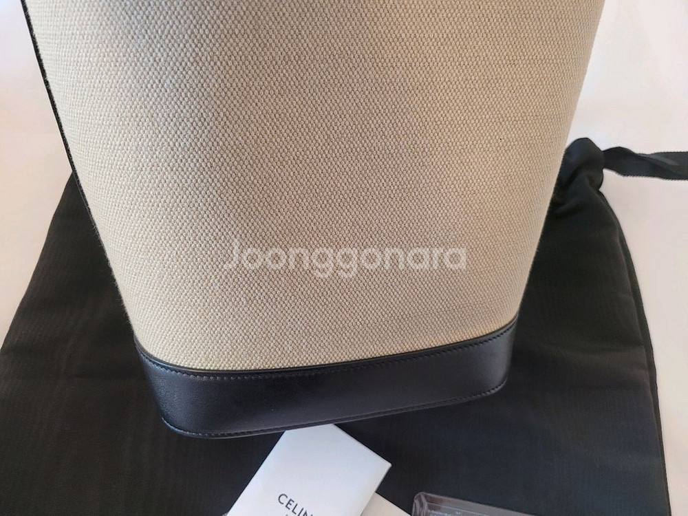 트리오페 캔버스 버킷백--1