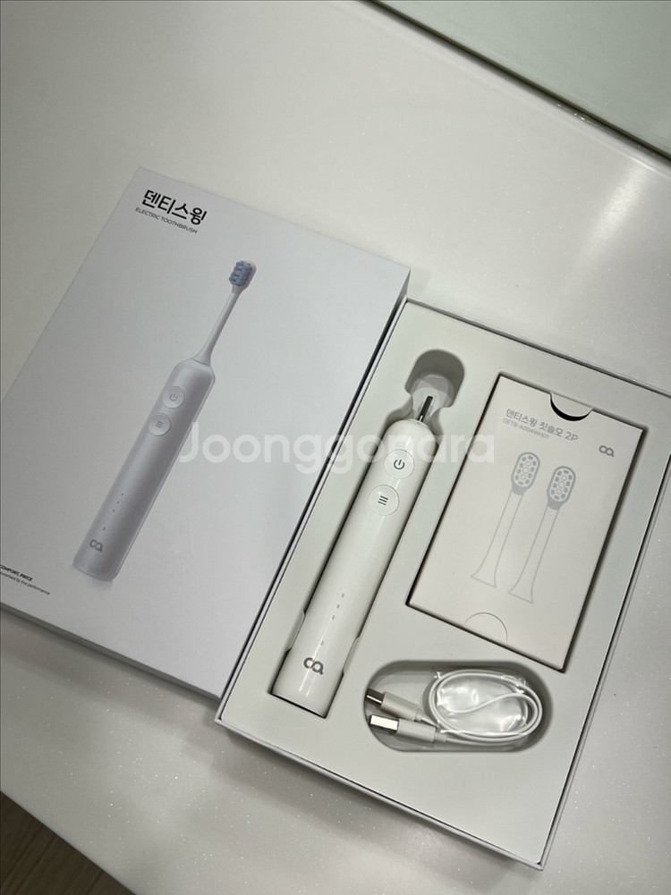 오아 덴티스윙 전동칫솔 화이트 팝니다--0