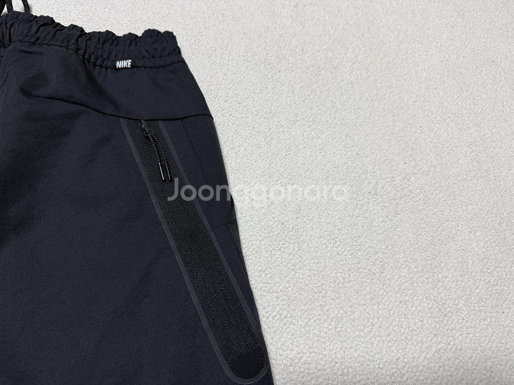 나이키 언라인드 커뮤터 테크 에센셜 우븐 팬츠 남성용 30인치--4