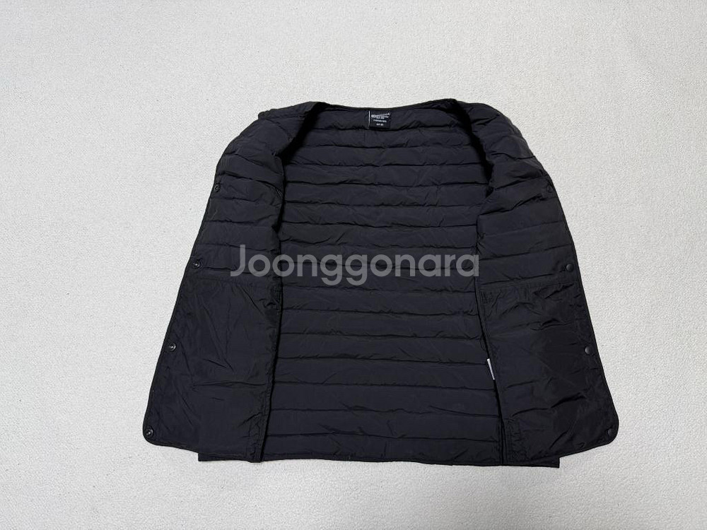 디스커버리 구스다운 경량패딩 조끼 여성용 100호 77사이즈--1