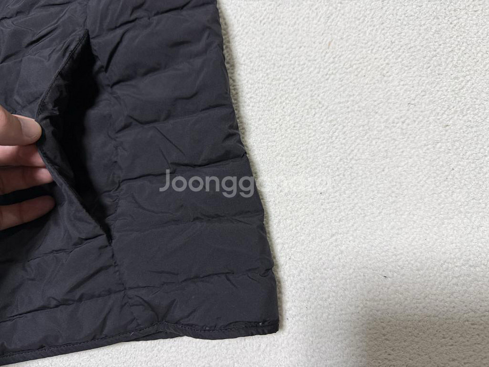 디스커버리 구스다운 경량패딩 조끼 여성용 100호 77사이즈--3