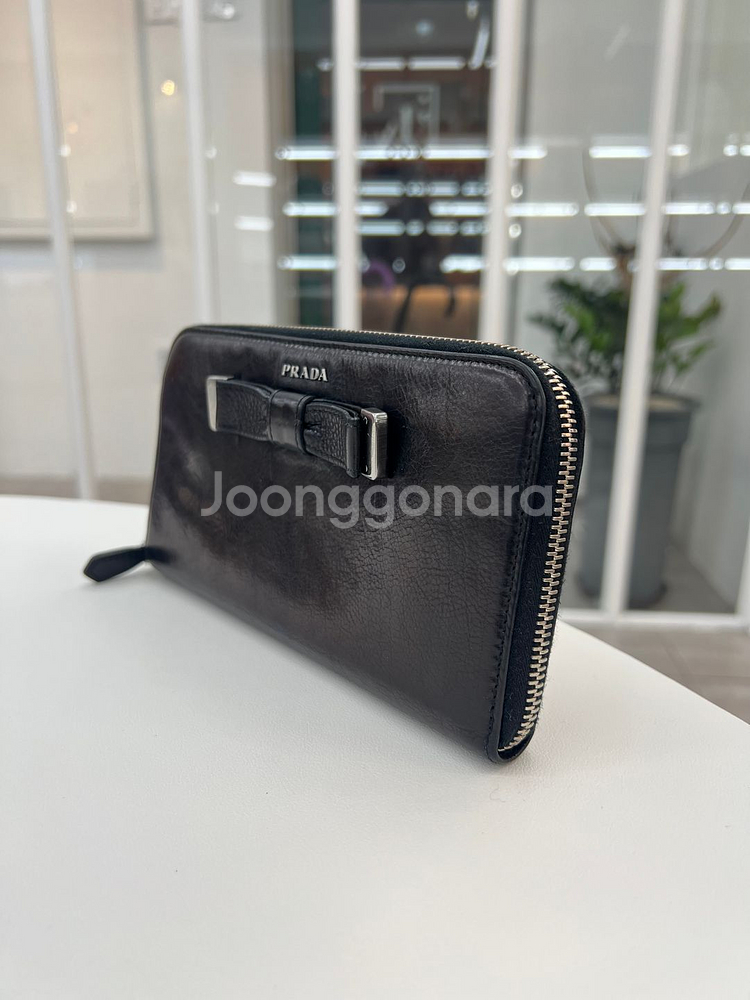 [중고명품 럭스올 울산점]프라다 레더 리본 장지갑 블랙 1M0506--1