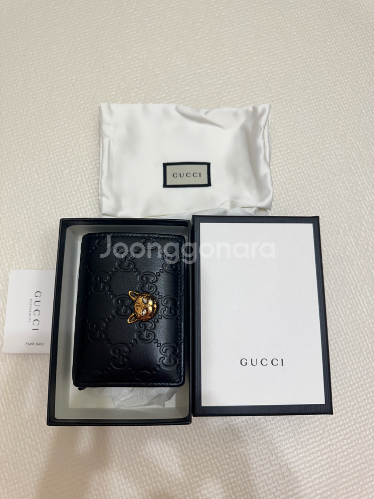 정품) 구찌 GG 엠보스 캣장식 반지갑--1