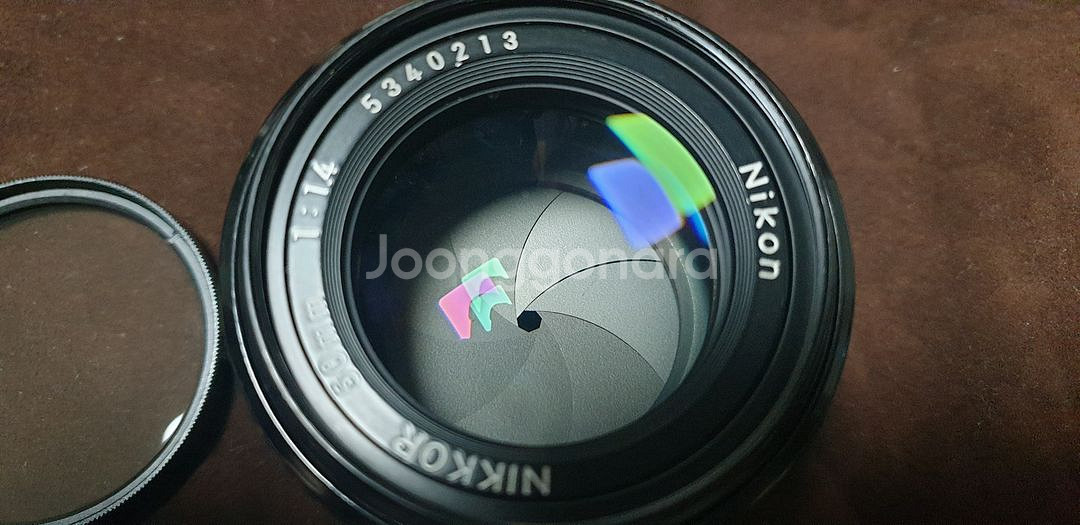 니콘 수동mf 50mm f1.4 렌즈팝니다--0